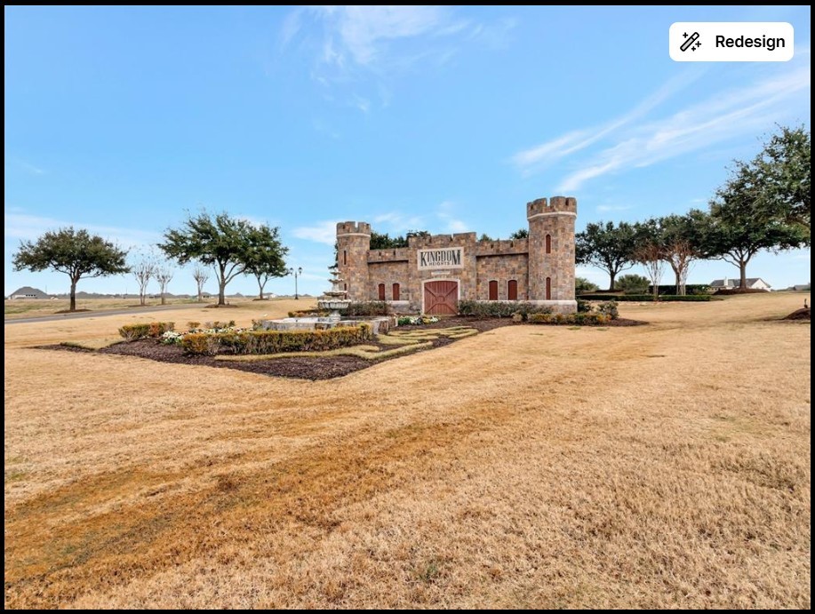 5514 Handlewood Lane Rosenberg, TX 77471 - Photo 2 of 6 This photo features a charming, castle-like structure set amidst expansive, manicured grounds with mature trees, offering a unique and picturesque entrance to a residential community.