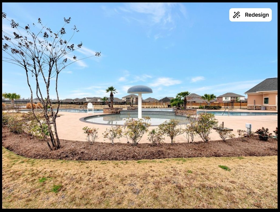 5514 Handlewood Lane Rosenberg, TX 77471 - Photo 5 of 6 This photo showcases a community pool area with a mushroom water feature, surrounded by landscaped greenery and neighboring homes, perfect for family relaxation and recreation.
