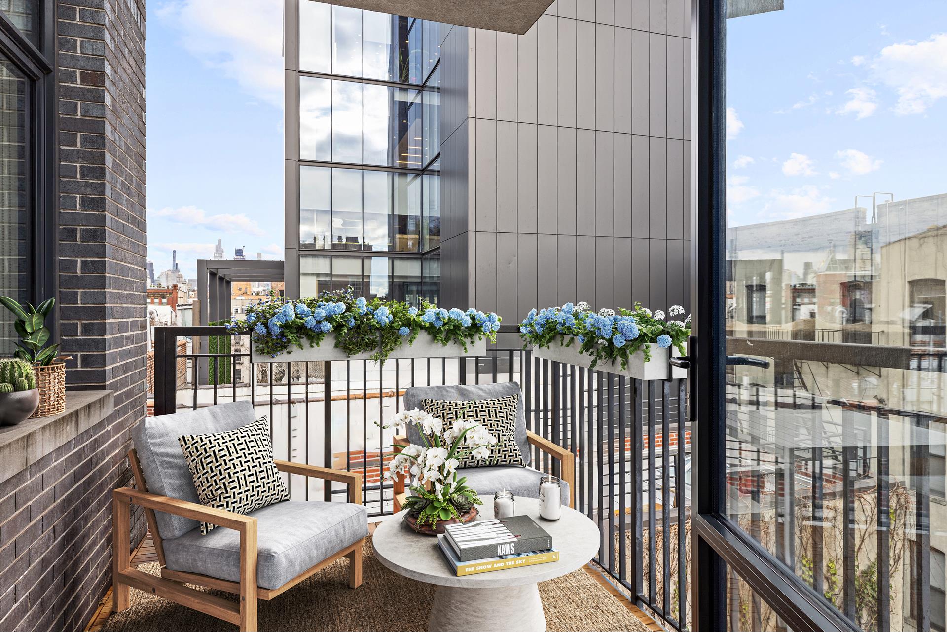 204 Forsyth Street, Unit PH6 Manhattan, NY 10002 - Photo 16 of 22 a view of a balcony with wooden floor
