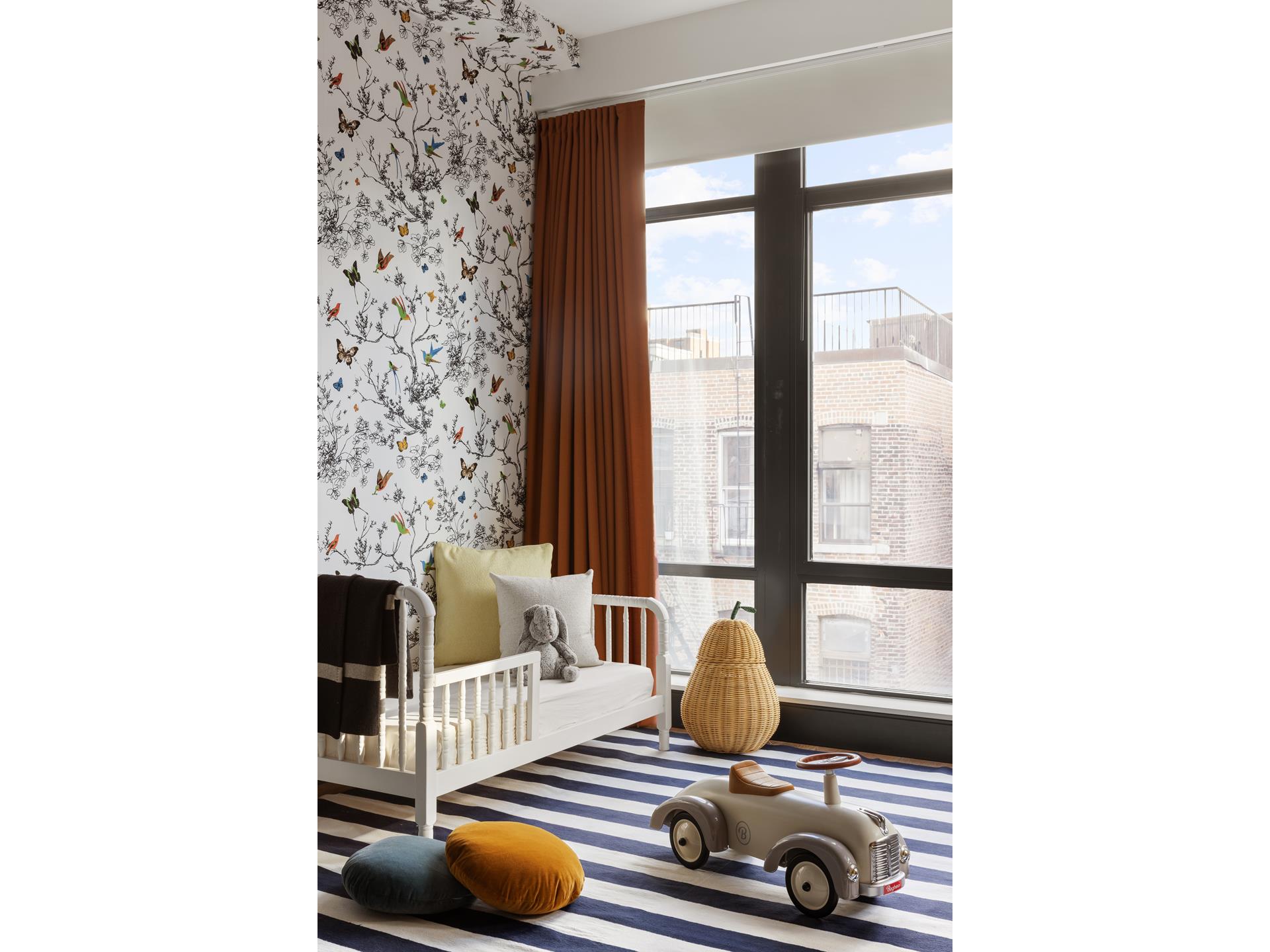 204 Forsyth Street, Unit PH6 Manhattan, NY 10002 - Photo 19 of 22 a room with furniture and a window