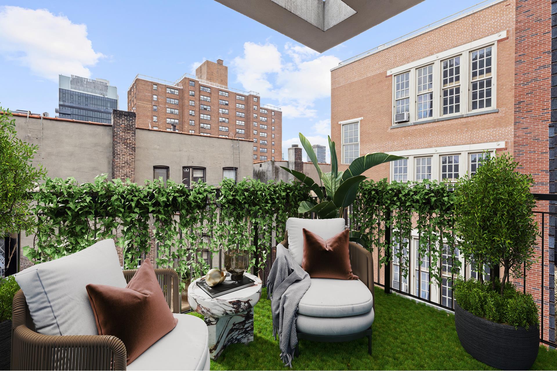 204 Forsyth Street, Unit PH6 Manhattan, NY 10002 - Photo 20 of 22 a view of a patio with couches chairs and a potted plant