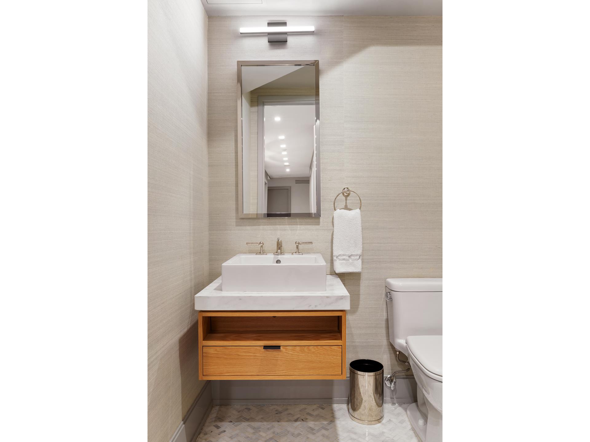 204 Forsyth Street, Unit PH6 Manhattan, NY 10002 - Photo 21 of 22 a bathroom with a sink and a toilet