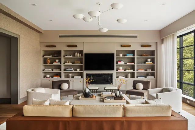 a dining room with furniture a rug and wooden floor