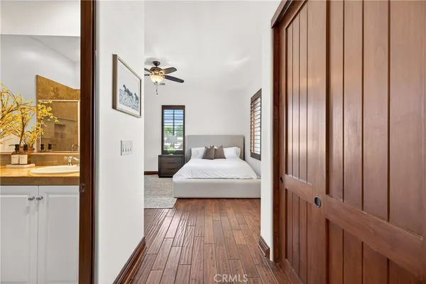 a view of a bedroom from a hallway