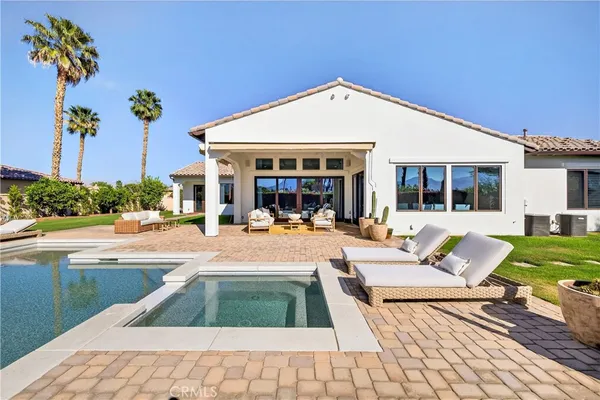 a view of a dinning table and chair in the patio