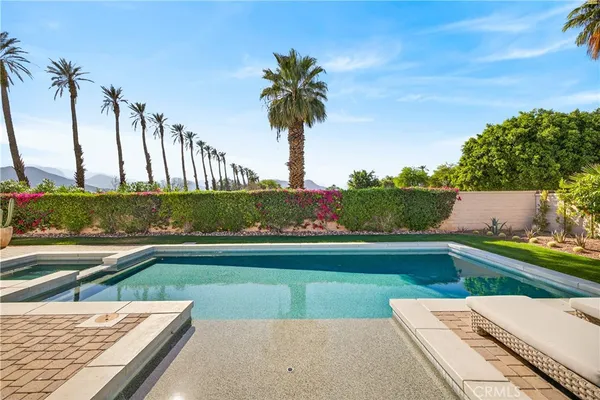 a view of a yard with a patio