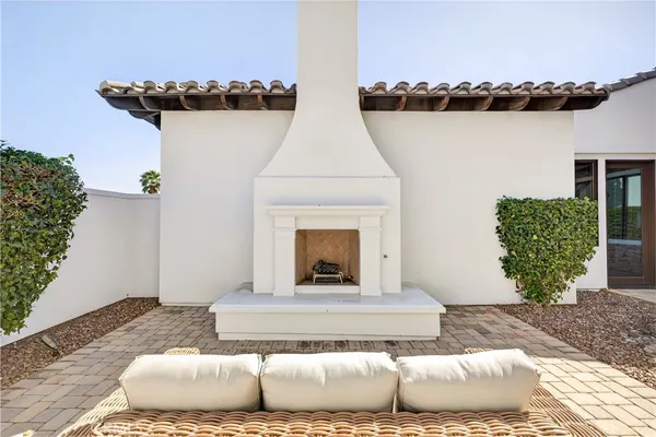 a view of a living room and a fireplace