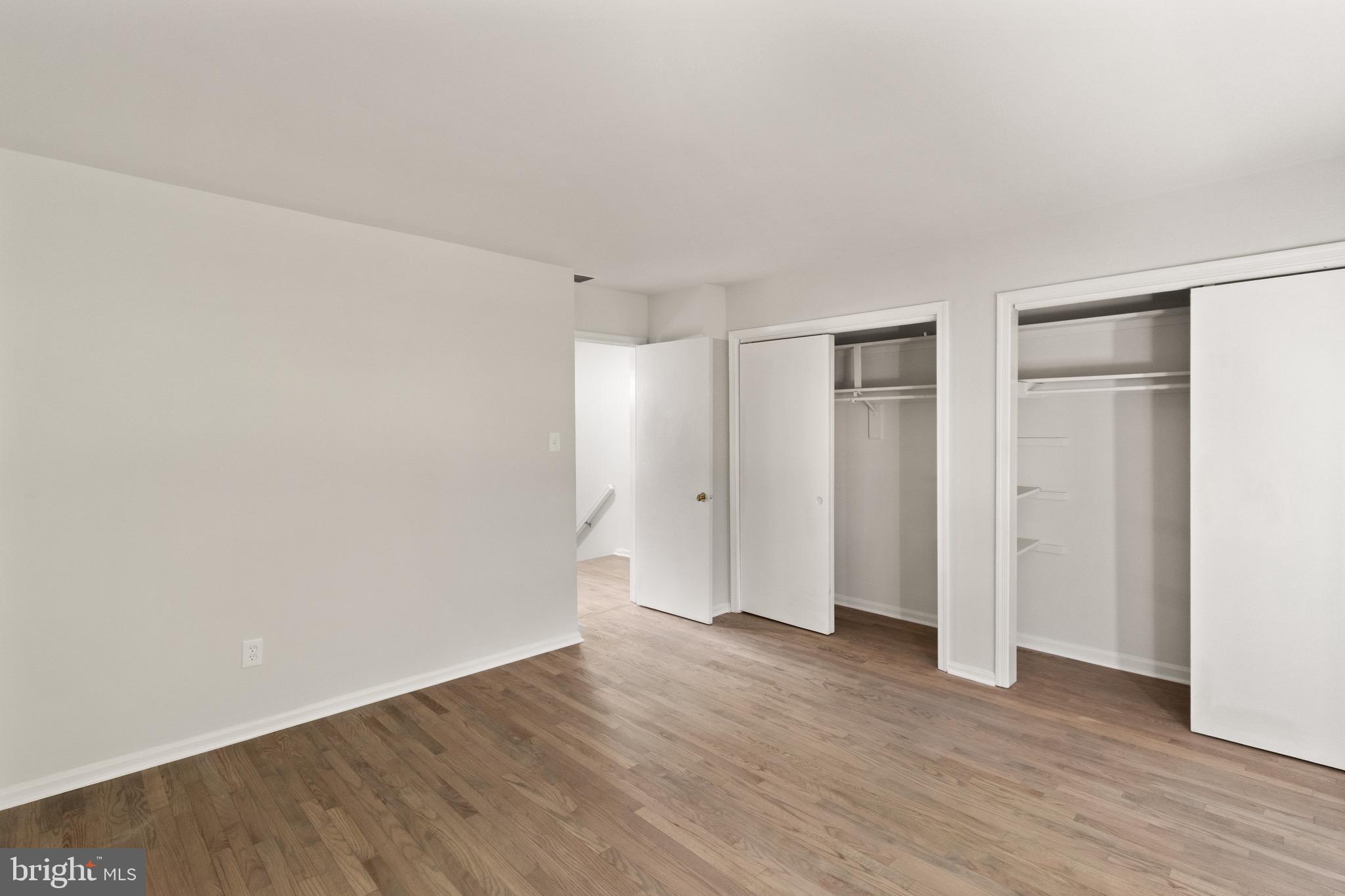 8519 Westover Court, Unit 763 Springfield, VA 22152 - Photo 18 of 36 a view of an empty room with wooden floor
