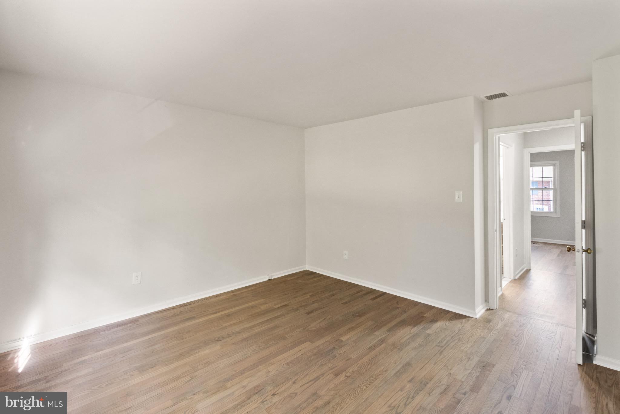 8519 Westover Court, Unit 763 Springfield, VA 22152 - Photo 19 of 36 a view of a room with wooden floor