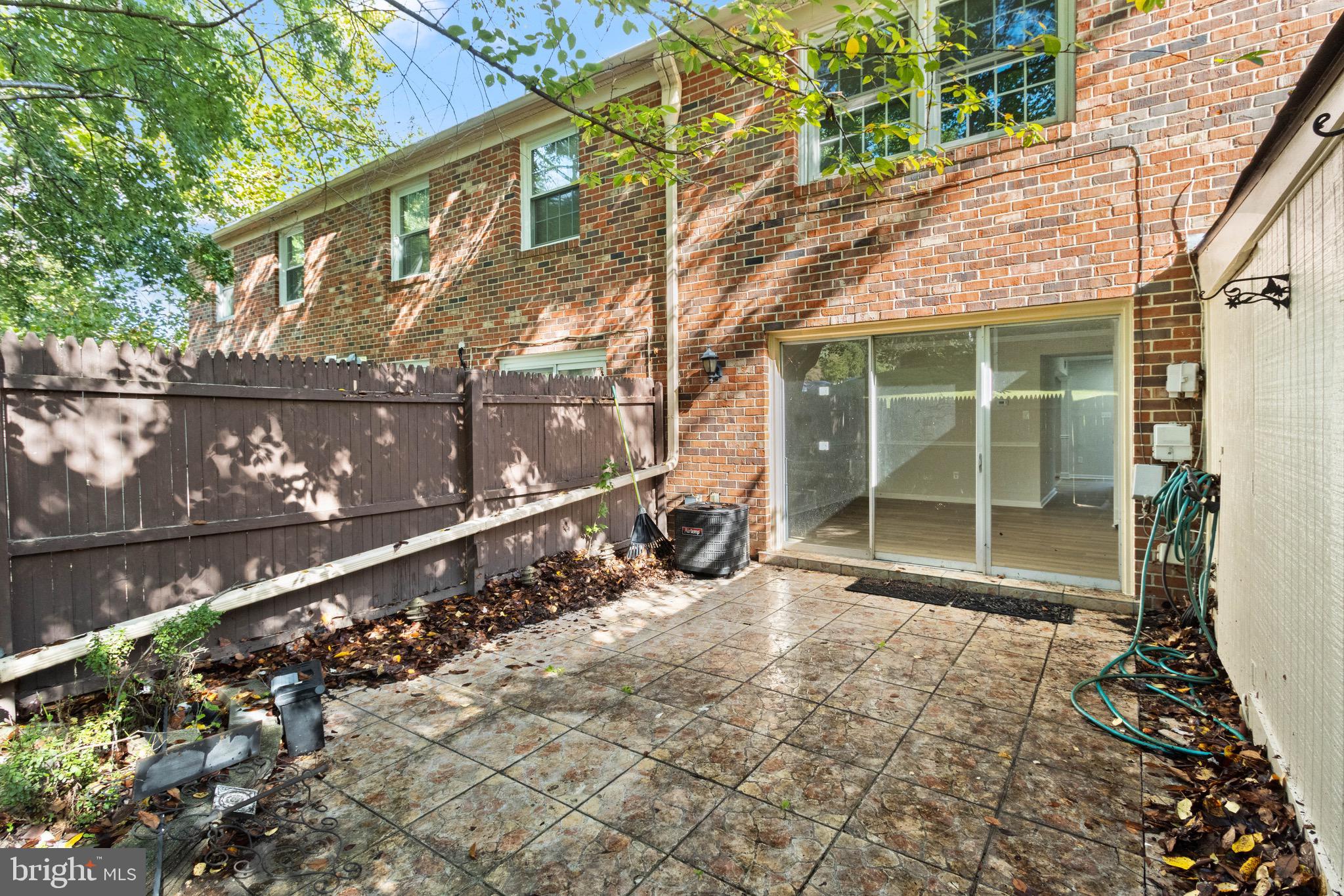 8519 Westover Court, Unit 763 Springfield, VA 22152 - Photo 28 of 36 a view of a house with a yard