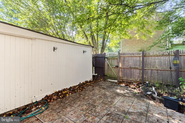 a kitchen with a refrigerator and a sink