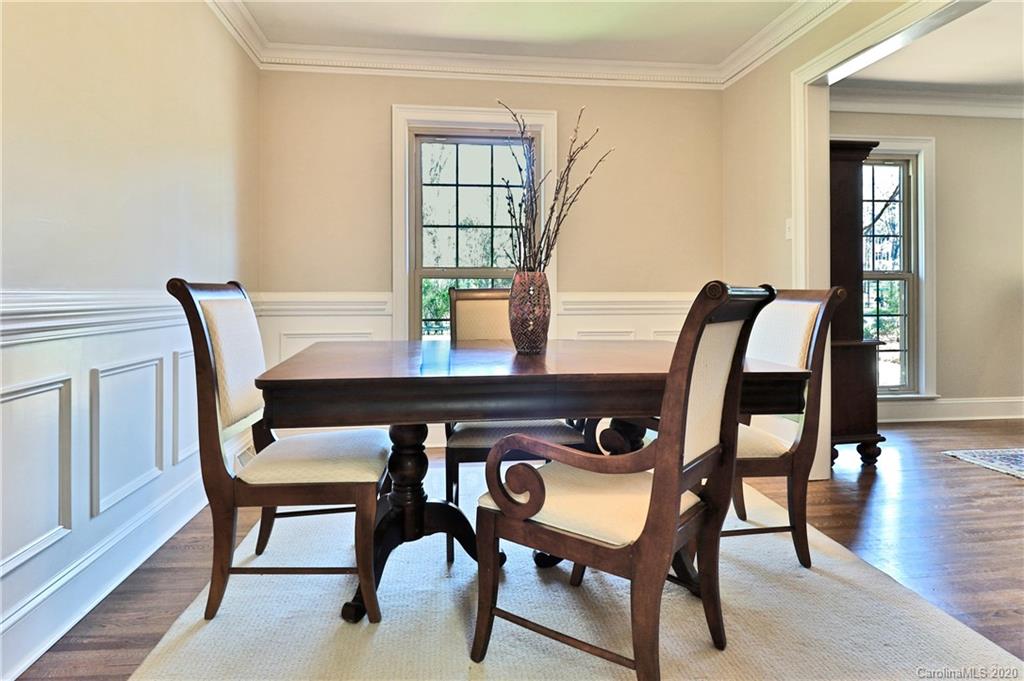 3532 Mountainbrook Road Charlotte, NC 28226 - Photo 2 of 45 a view of a dining room with furniture and wooden floor