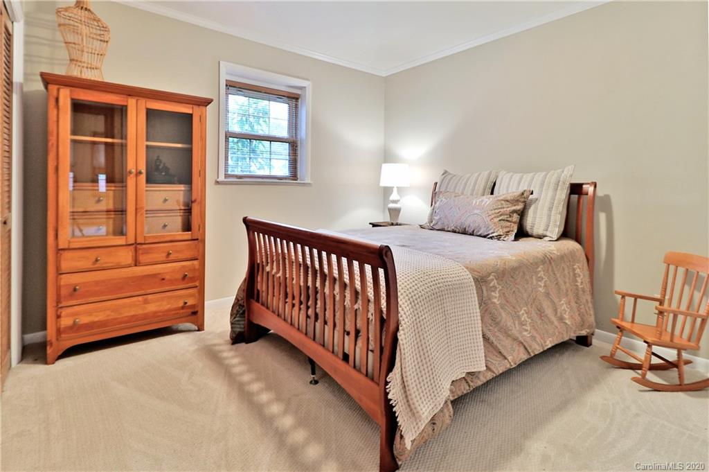 3532 Mountainbrook Road Charlotte, NC 28226 - Photo 17 of 45 a bedroom with a bed and a dresser