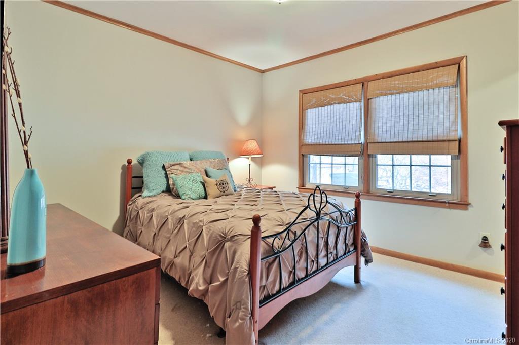 3532 Mountainbrook Road Charlotte, NC 28226 - Photo 19 of 45 a bedroom with a bed and window