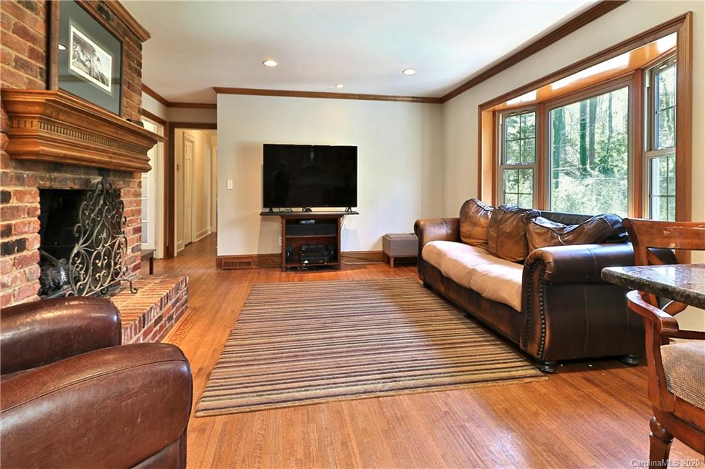 3532 Mountainbrook Road Charlotte, NC 28226 - Photo 3 of 45 a living room with furniture and a flat screen tv