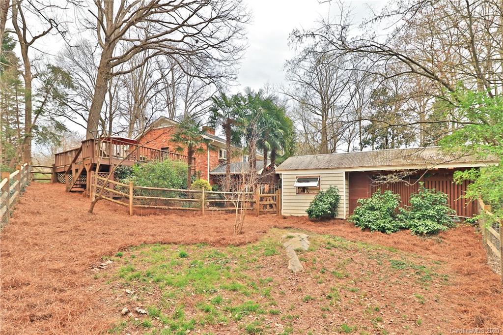 3532 Mountainbrook Road Charlotte, NC 28226 - Photo 26 of 45 front view of a house with a yard and an trees