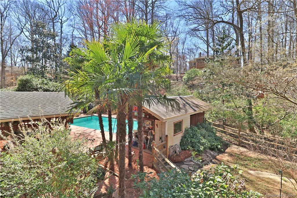3532 Mountainbrook Road Charlotte, NC 28226 - Photo 30 of 45 a view of a house with a yard and potted plants