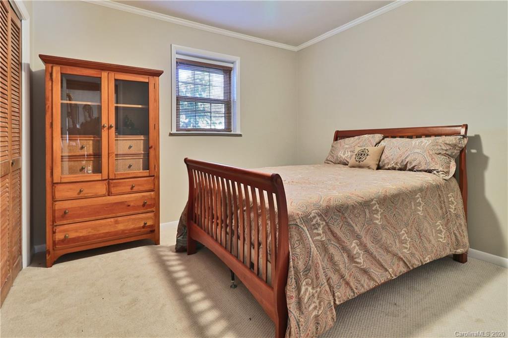 3532 Mountainbrook Road Charlotte, NC 28226 - Photo 35 of 45 a bedroom with a bed and a window