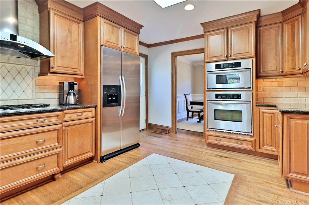 3532 Mountainbrook Road Charlotte, NC 28226 - Photo 5 of 45 a kitchen with stainless steel appliances granite countertop a refrigerator oven stove a sink and dishwasher