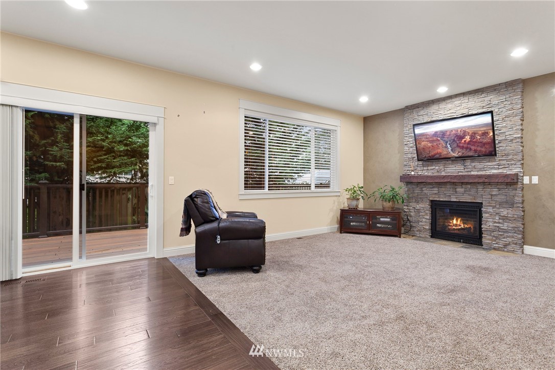 32233 Military Road South Federal Way, WA 98001 - Photo 13 of 28 a living room with furniture and a fireplace