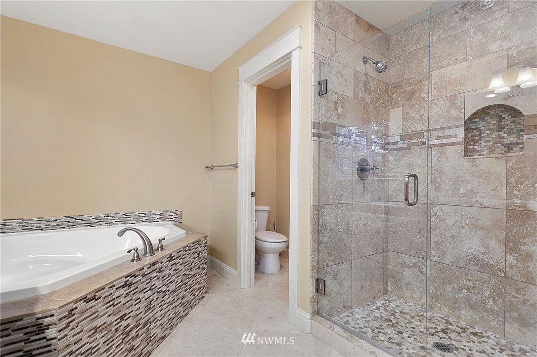 32233 Military Road South Federal Way, WA 98001 - Photo 21 of 28 a bathroom with a bathtub and shower