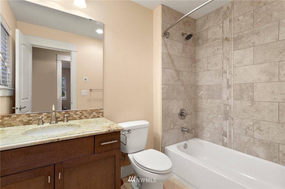 32233 Military Road South Federal Way, WA 98001 - Photo 24 of 28 a bathroom with a sink a toilet and shower