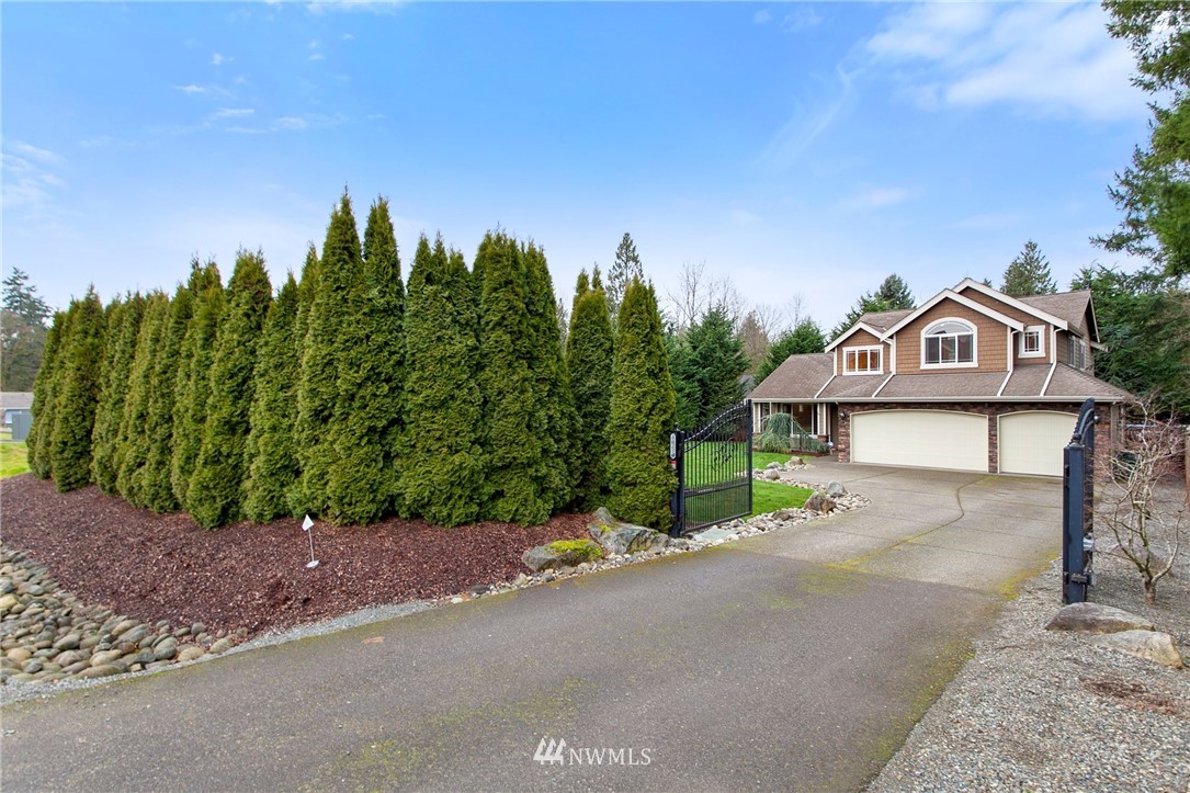 32233 Military Road South Federal Way, WA 98001 - Photo 3 of 28 a view of a street with a building in the background