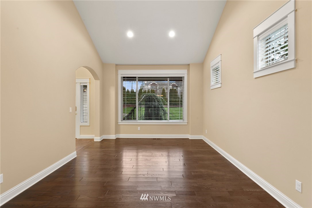 32233 Military Road South Federal Way, WA 98001 - Photo 6 of 28 a view of an empty room with wooden floor and a window