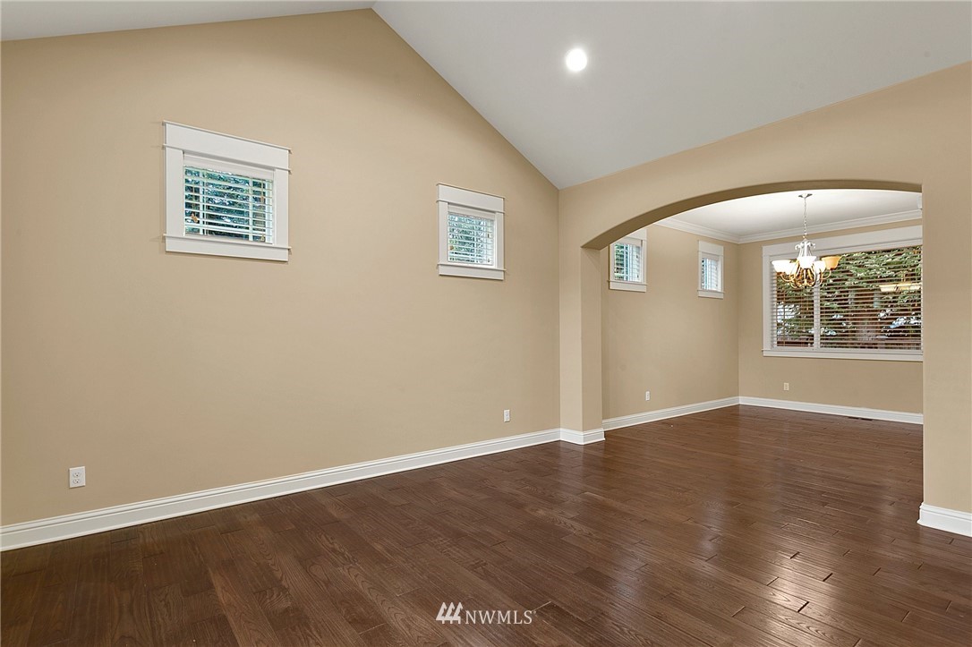 32233 Military Road South Federal Way, WA 98001 - Photo 7 of 28 an empty room with wooden floor and windows