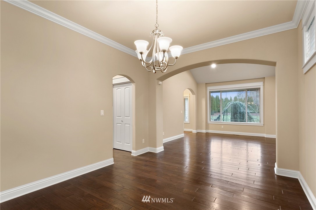 32233 Military Road South Federal Way, WA 98001 - Photo 9 of 28 a view of an empty room with wooden floor and a window