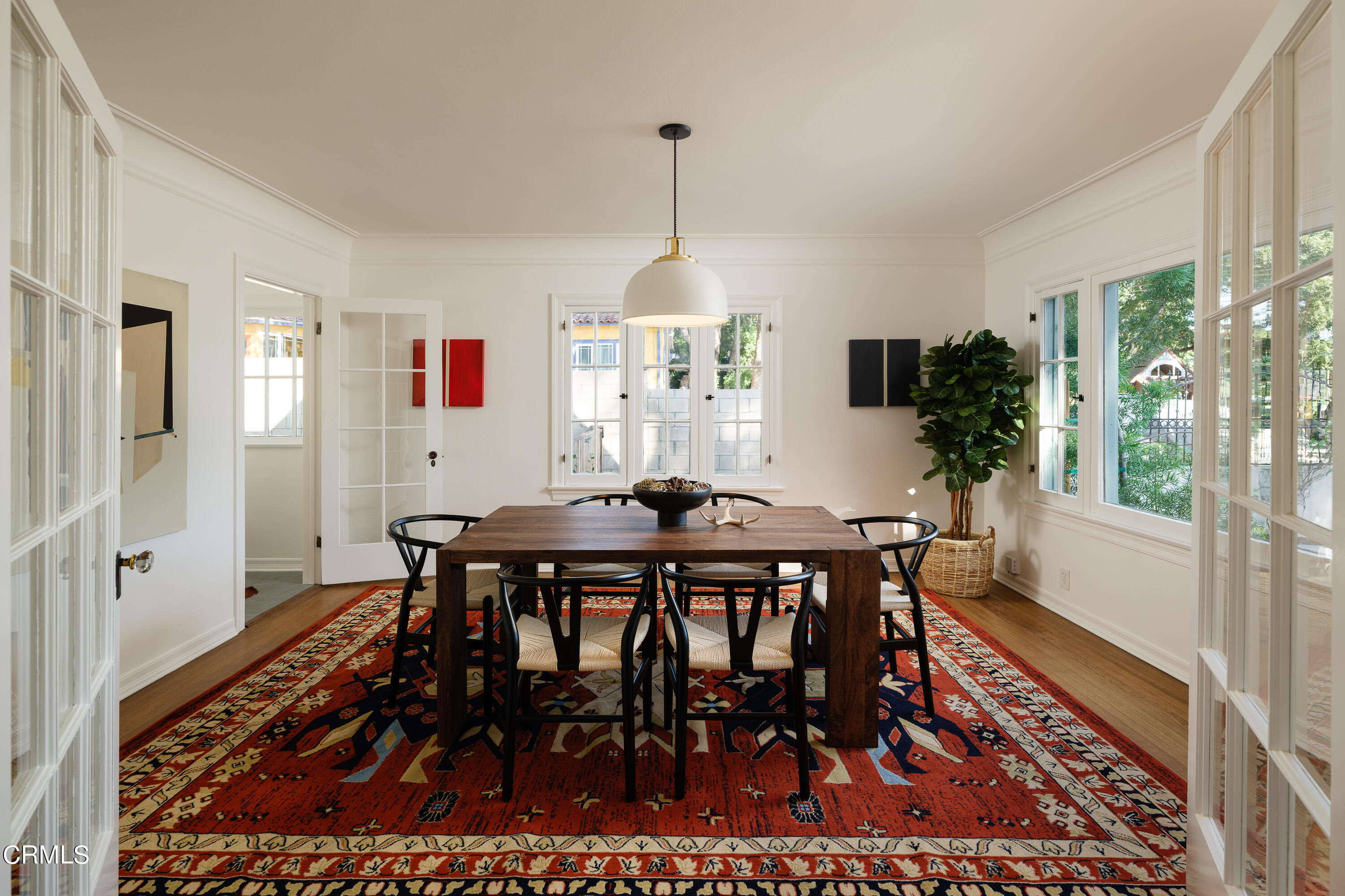 53 East Altadena Drive Altadena, CA 91001 - Photo 13 of 69 a view of a dining room with furniture window and wooden floor