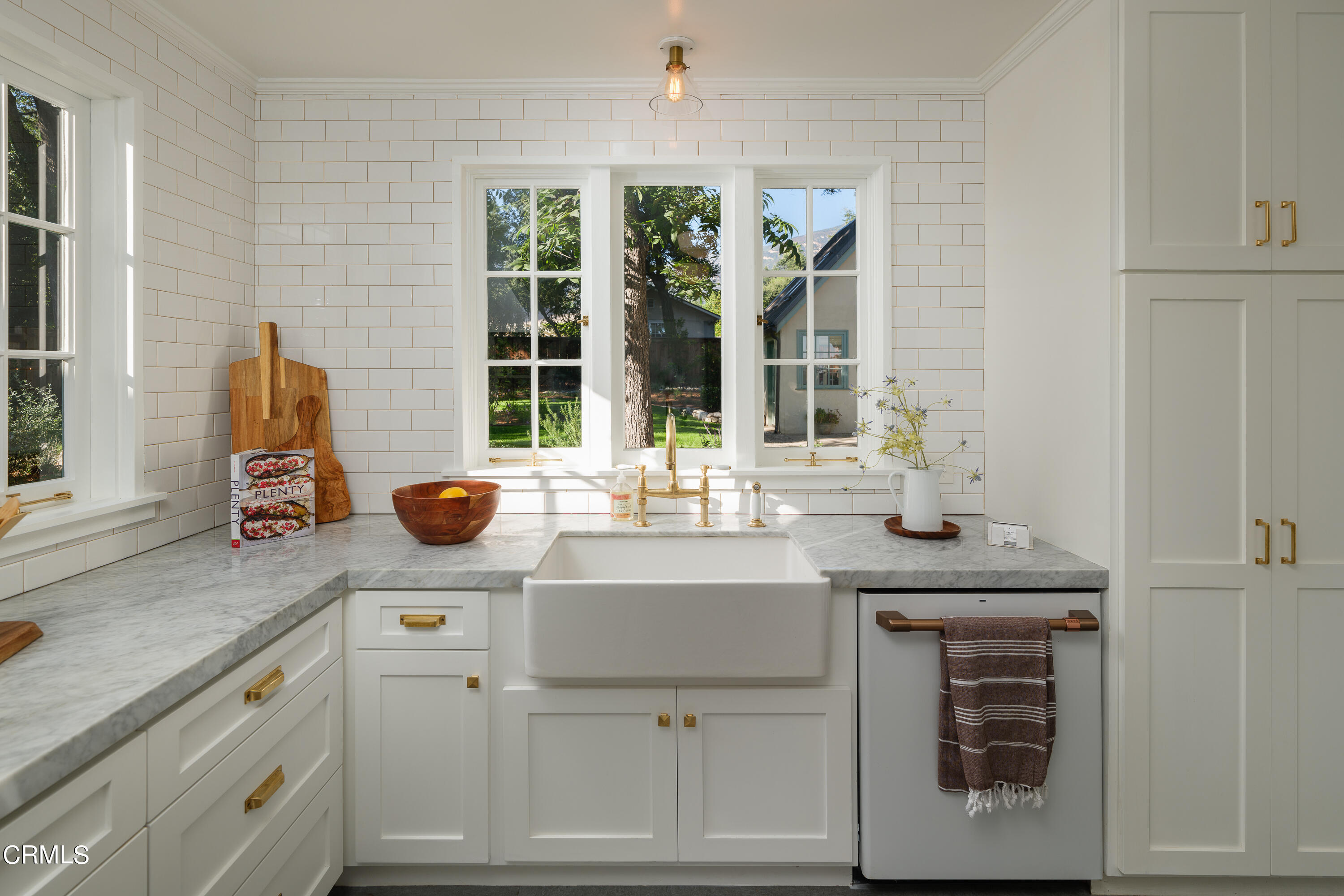 53 East Altadena Drive Altadena, CA 91001 - Photo 16 of 69 a kitchen with appliances cabinets and a potted plant