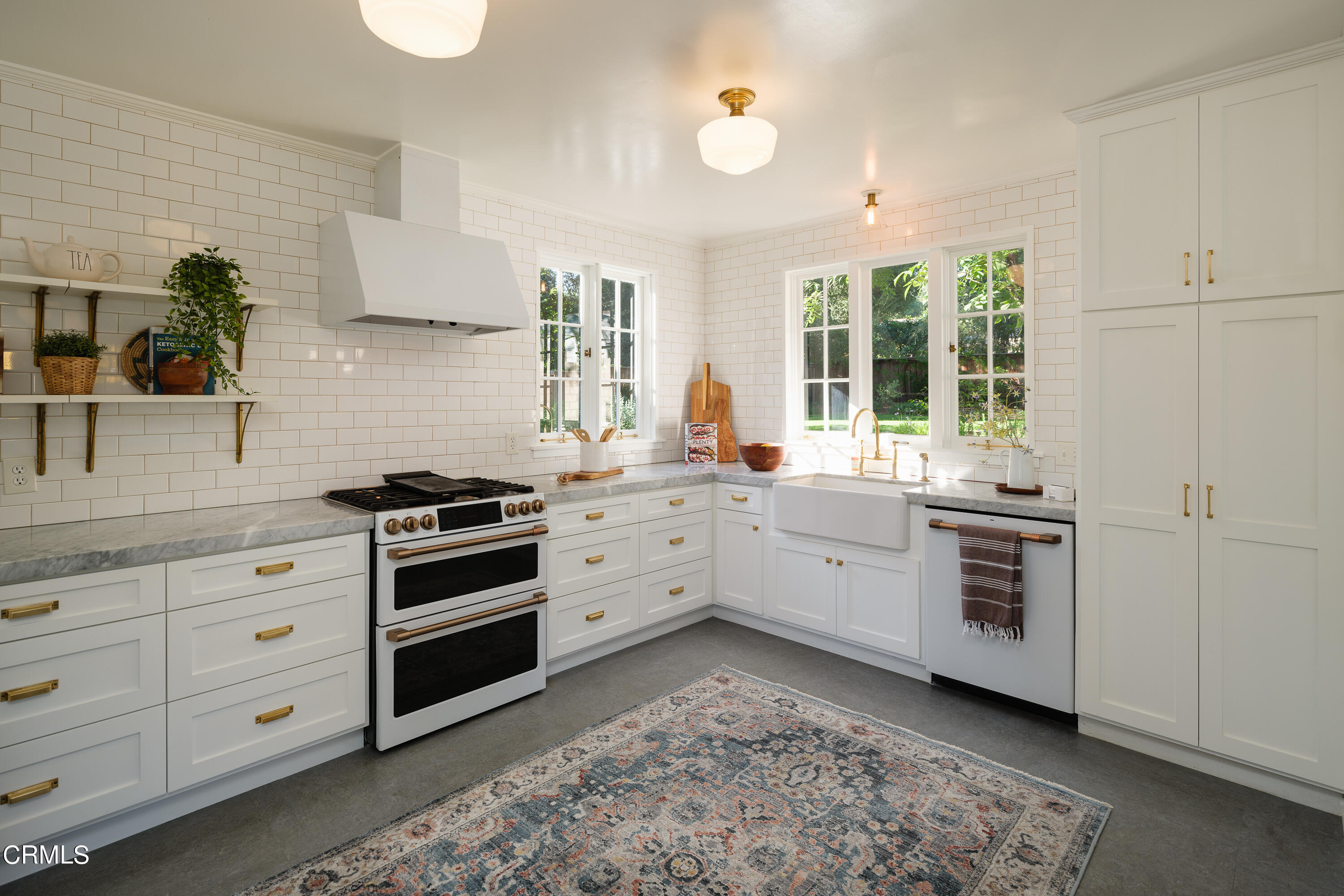 53 East Altadena Drive Altadena, CA 91001 - Photo 17 of 69 a kitchen with granite countertop white cabinets and white appliances