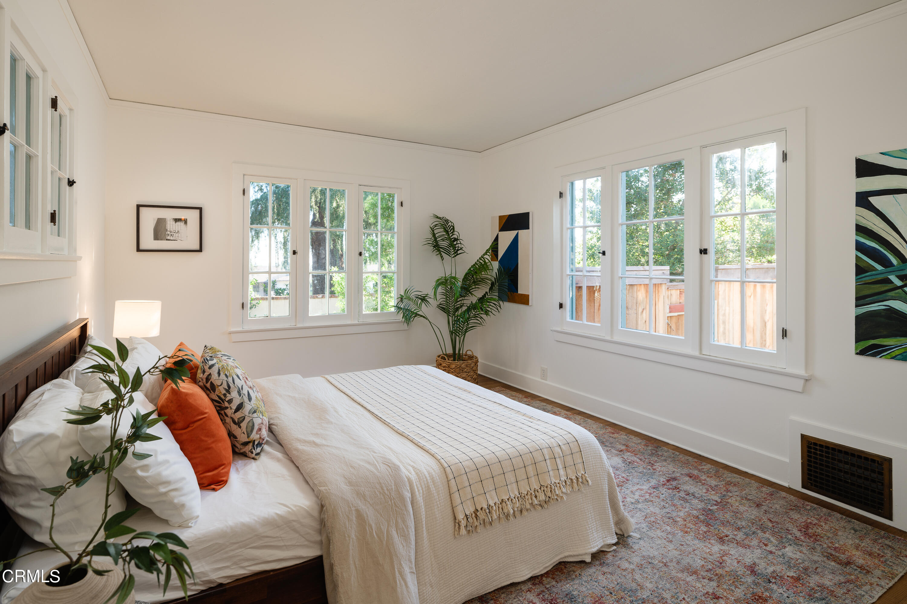 53 East Altadena Drive Altadena, CA 91001 - Photo 25 of 69 a bedroom with a bed and wooden floor