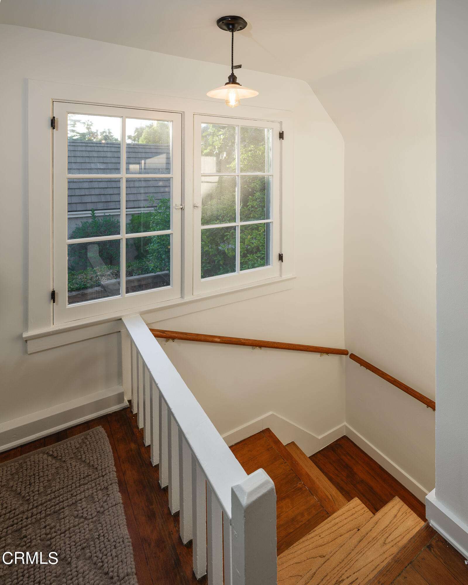53 East Altadena Drive Altadena, CA 91001 - Photo 27 of 69 a view of an empty room with wooden floor and a window