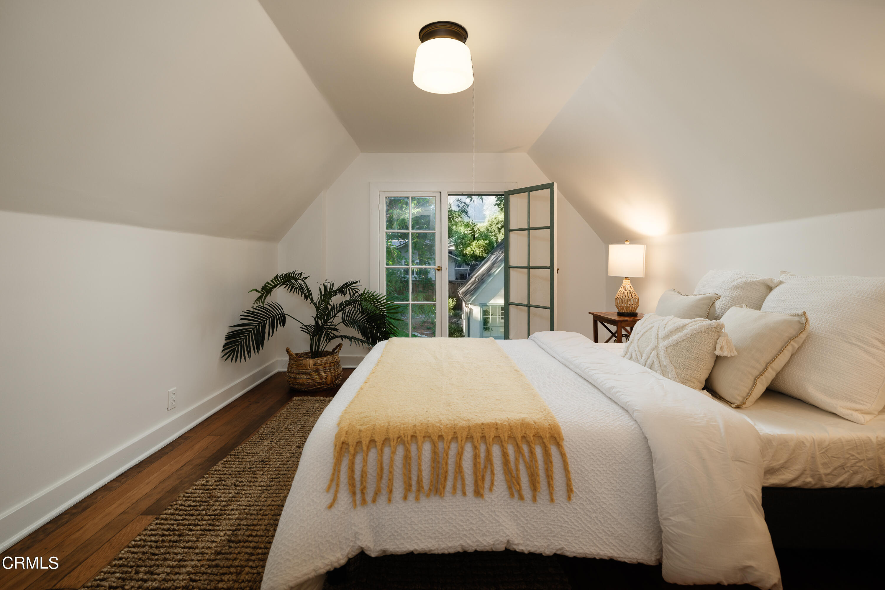 53 East Altadena Drive Altadena, CA 91001 - Photo 30 of 69 a bed sitting in a bedroom next to a window