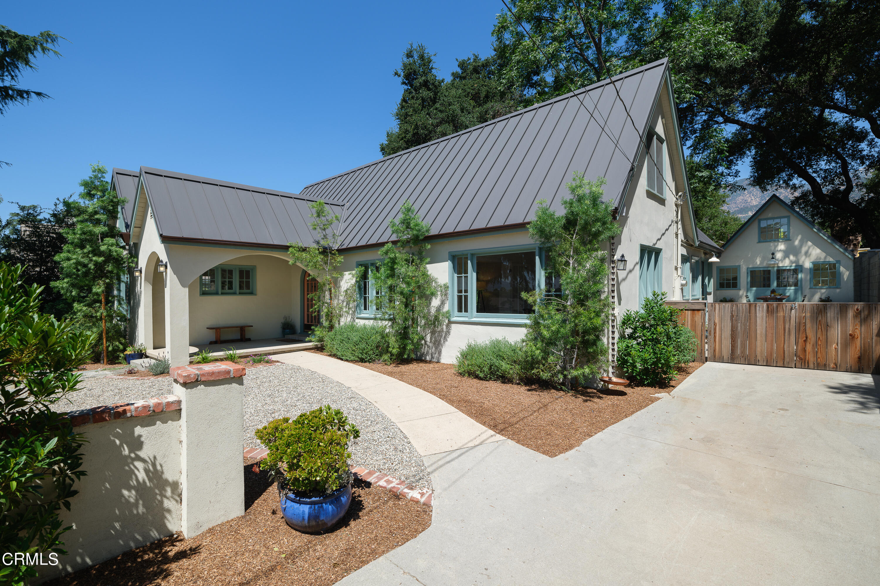 53 East Altadena Drive Altadena, CA 91001 - Photo 62 of 69 a front view of a house with potted plants