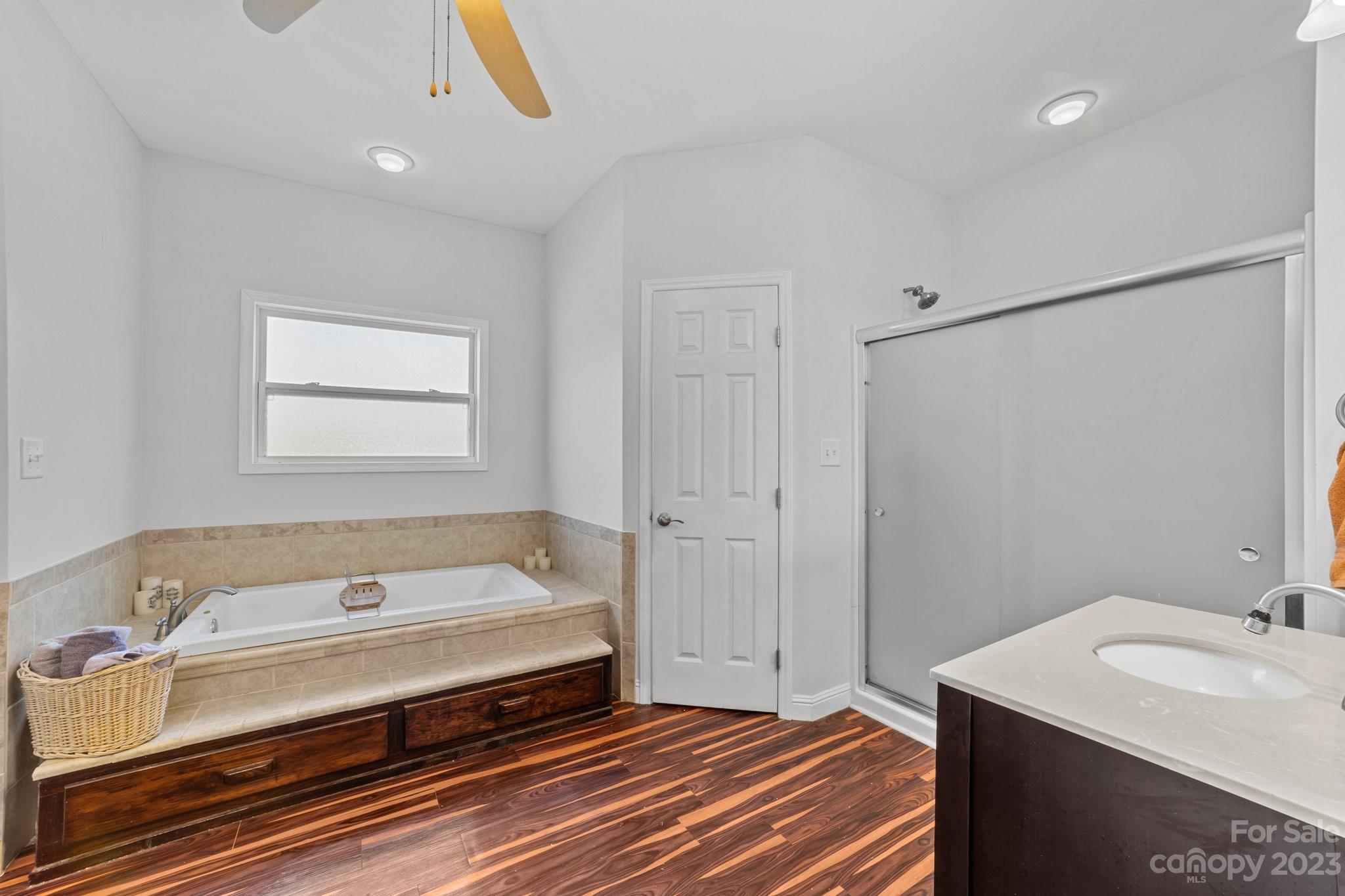 105 Vista Drive Davidson, NC 28036 - Photo 18 of 29 a bathroom with a sink and a mirror