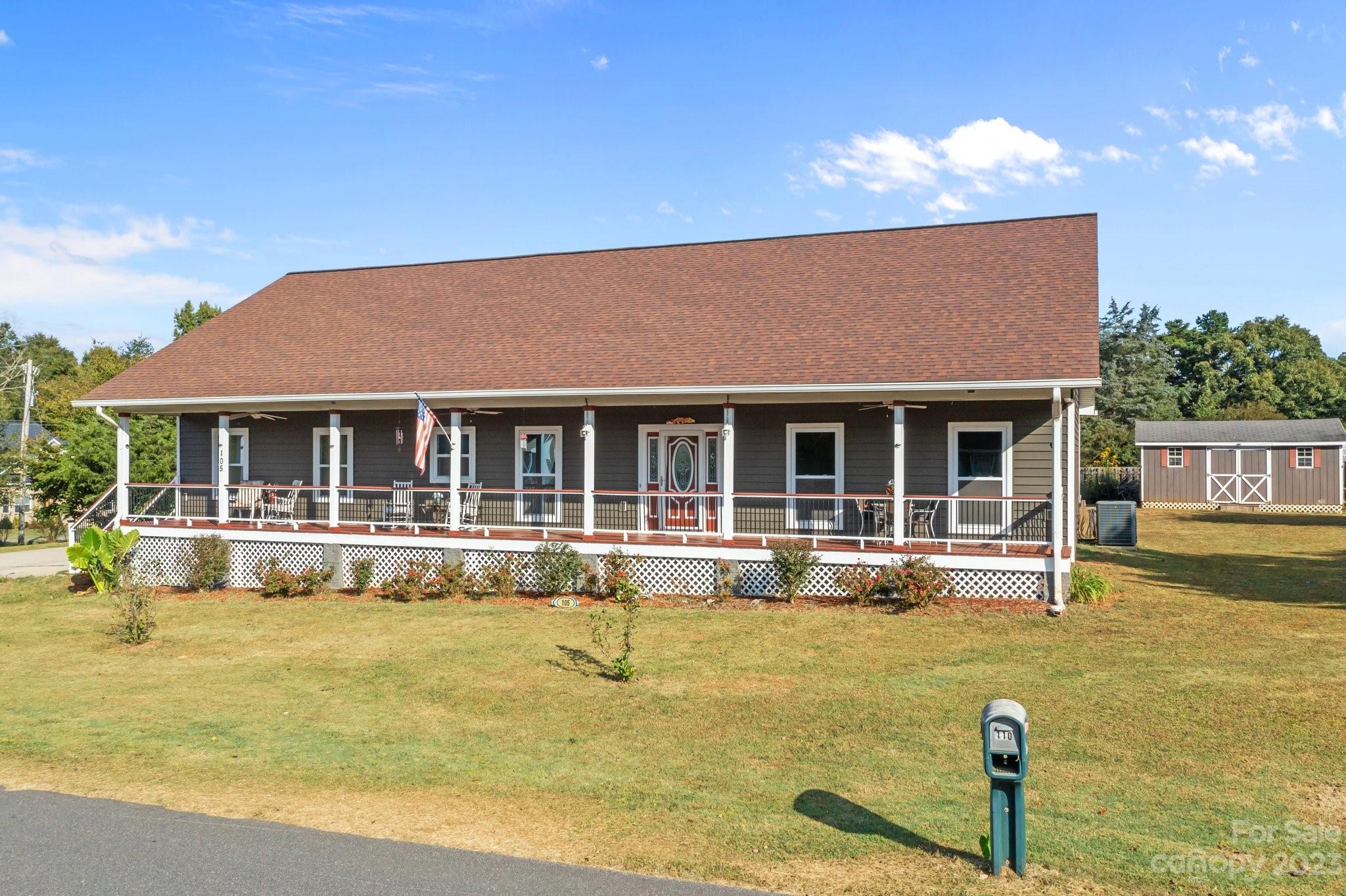 105 Vista Drive Davidson, NC 28036 - Photo 2 of 29 a front view of house with swimming pool and outdoor seating