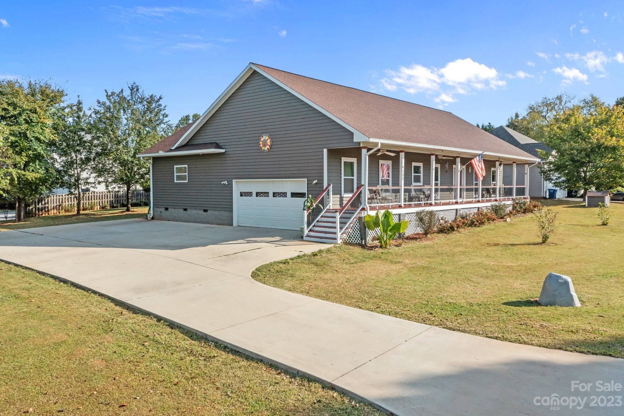 105 Vista Drive Davidson, NC 28036 - Photo 25 of 29 a front view of a house with a yard