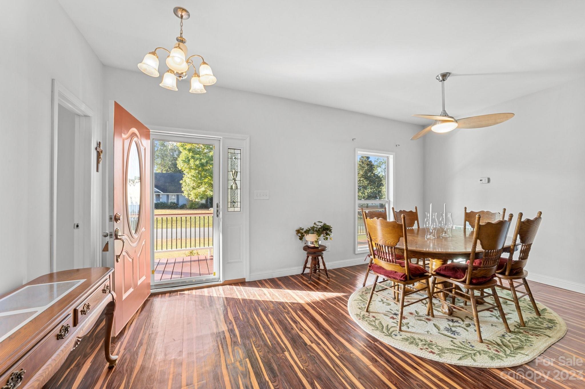 105 Vista Drive Davidson, NC 28036 - Photo 6 of 29 a view of a dining room with furniture window and wooden floor