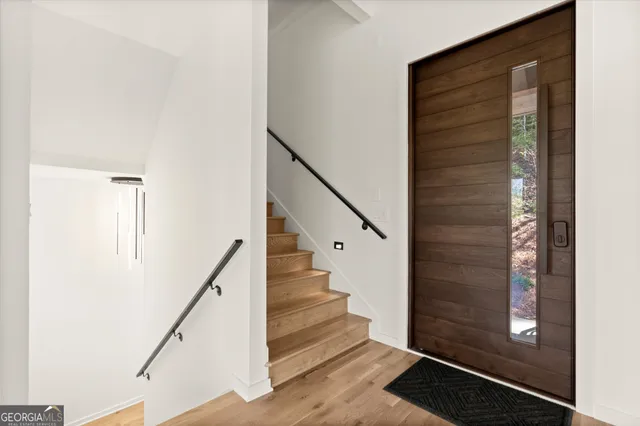a kitchen with a sink stove and refrigerator