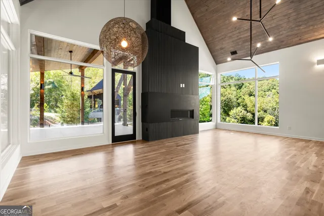 a kitchen with a sink stove and refrigerator