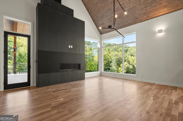 a kitchen with a sink and large window