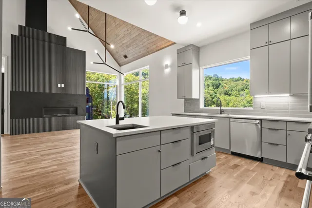 a white bath tub sitting next to a window