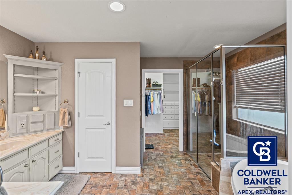 1316 Prairie Point Rhome, TX 76078 - Photo 14 of 30 a bathroom with a shower and a sink