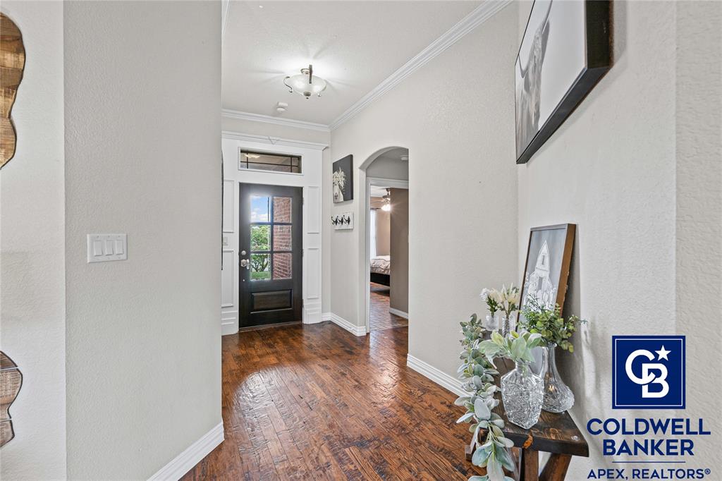 1316 Prairie Point Rhome, TX 76078 - Photo 5 of 30 a view of an entryway with wooden floor