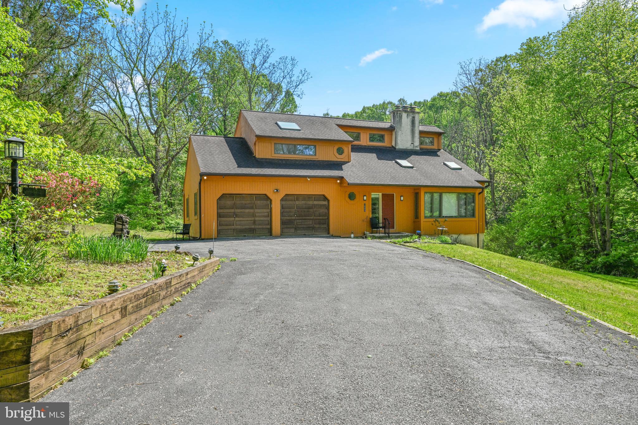 1680 East Street Road Kennett Square, PA 19348 - Photo 2 of 30 a front view of a house with a yard