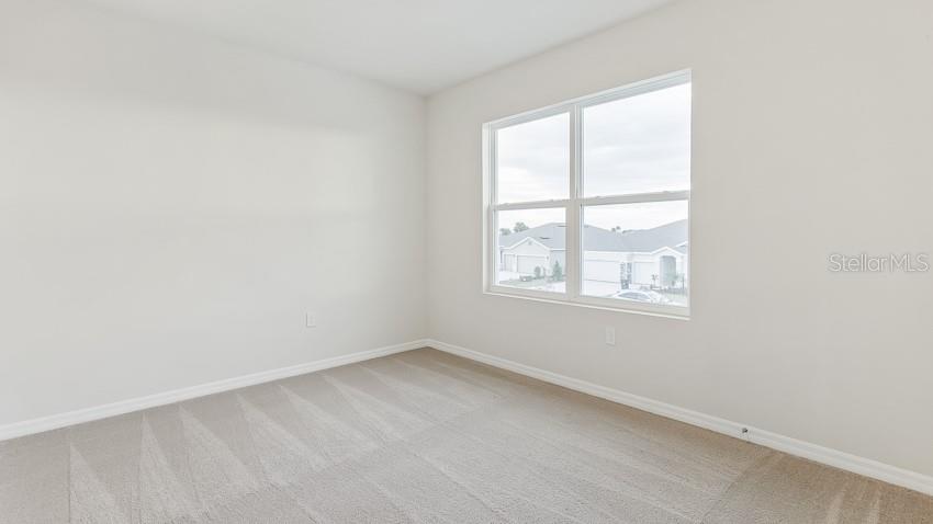 1925 Cobb Trail Parrish, FL 34219 - Photo 15 of 25 an empty room with a window