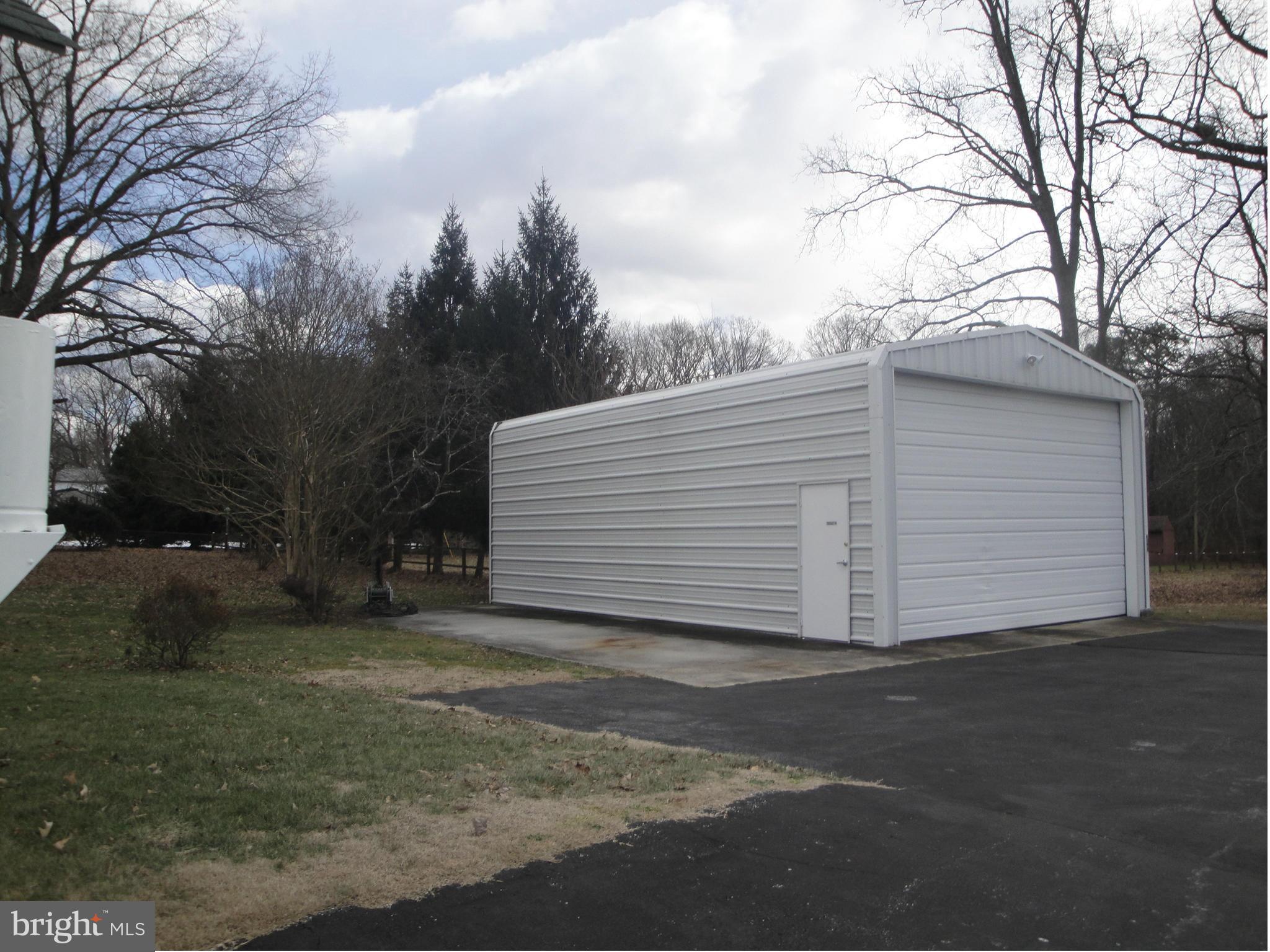 903 Bengies Road Baltimore, MD 21220 - Photo 3 of 18 a view of a house with a yard